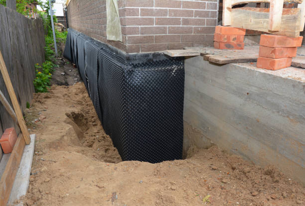 Happy homeowners after waterproofing job in Armada